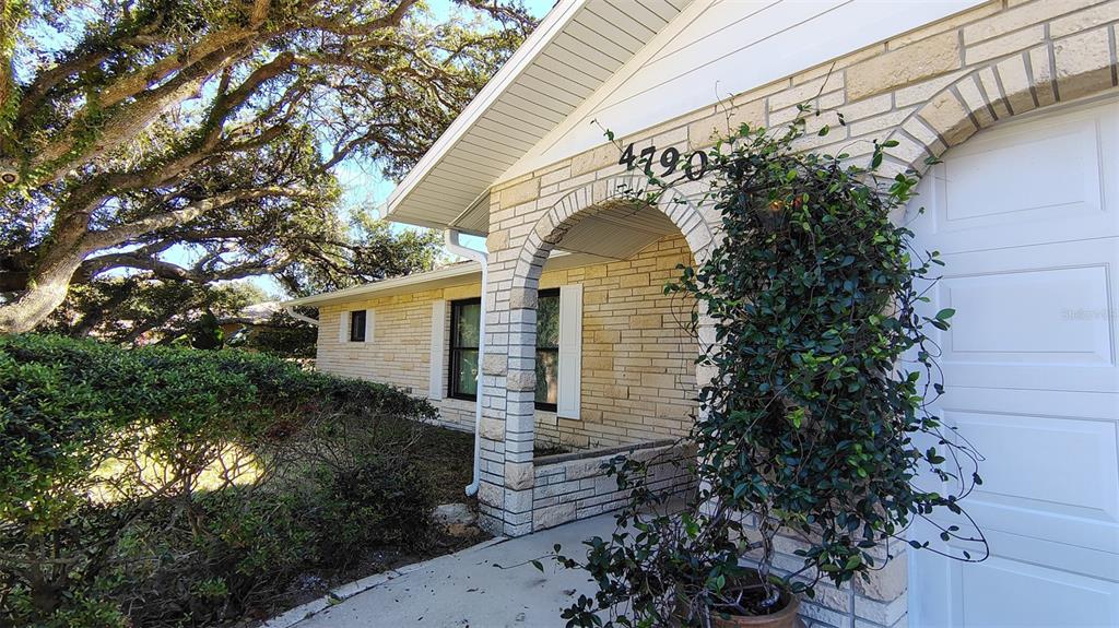 4790 Michael Lane Ponce Inlet, FL 32127 - Photo 2 of 35 a view of a house with a yard