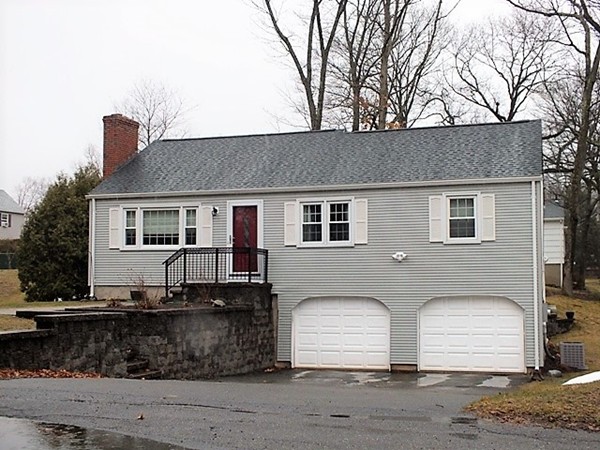 63 Albemarle Road Longmeadow, MA 01106 - Photo 1 of 27 a front view of a house with a yard