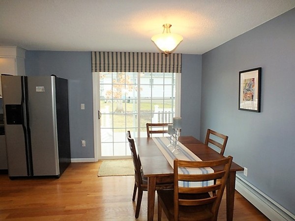 63 Albemarle Road Longmeadow, MA 01106 - Photo 12 of 27 a view of a dining room with furniture window and wooden floor