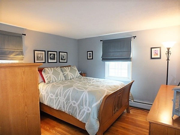 63 Albemarle Road Longmeadow, MA 01106 - Photo 13 of 27 a bedroom with a bed and a window