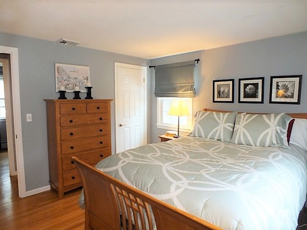 63 Albemarle Road Longmeadow, MA 01106 - Photo 14 of 27 a bedroom with a bed and a window
