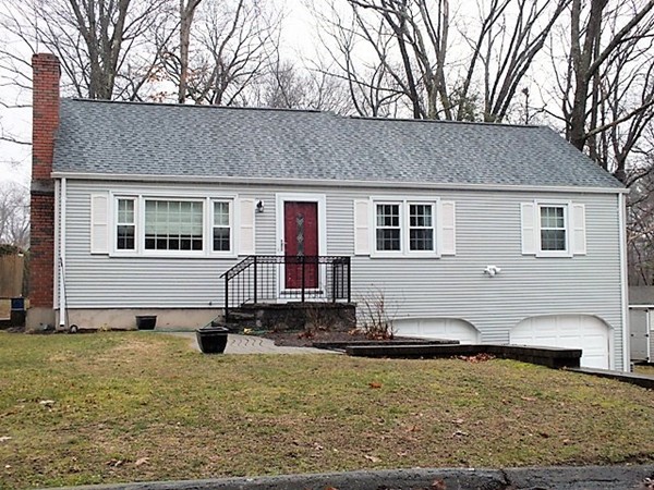 63 Albemarle Road Longmeadow, MA 01106 - Photo 2 of 27 a front view of a house with yard