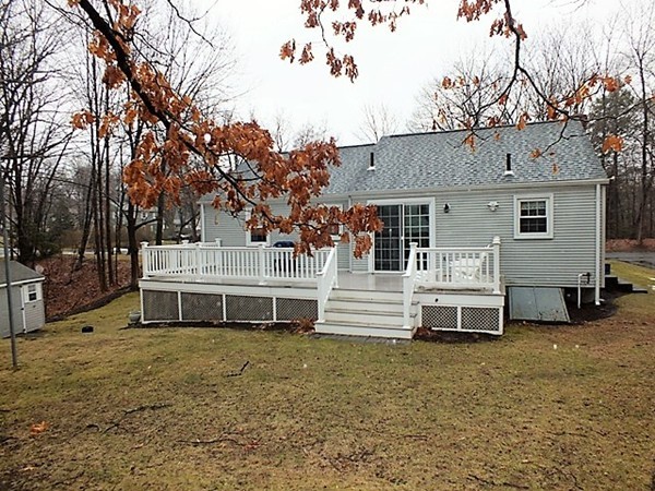 63 Albemarle Road Longmeadow, MA 01106 - Photo 25 of 27 a white building that has a tree in front of it