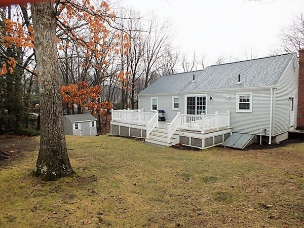 63 Albemarle Road Longmeadow, MA 01106 - Photo 26 of 27 a white house that has a tree in front of it