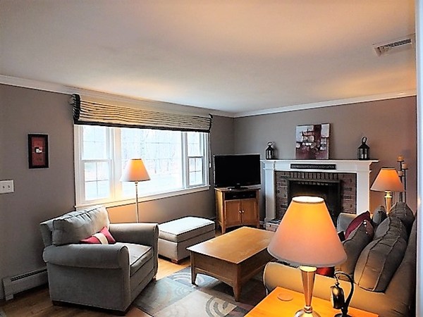 63 Albemarle Road Longmeadow, MA 01106 - Photo 3 of 27 a living room with furniture and a flat screen tv