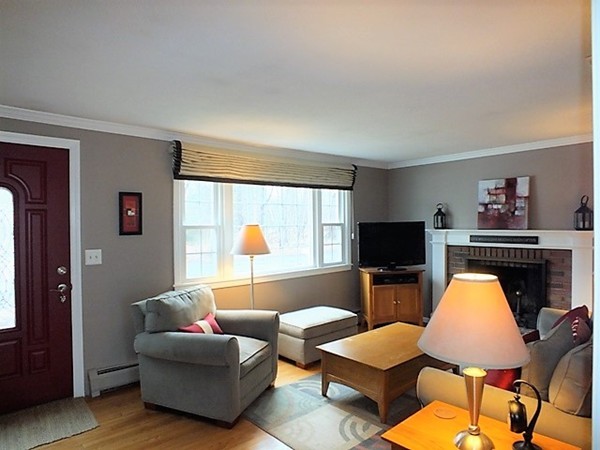 63 Albemarle Road Longmeadow, MA 01106 - Photo 4 of 27 a living room with furniture and a flat screen tv