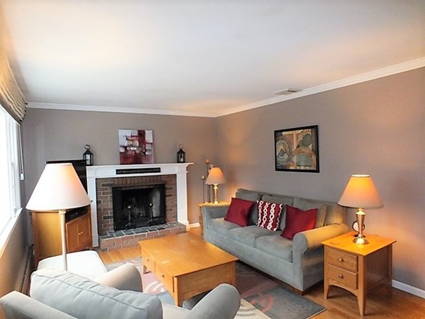 63 Albemarle Road Longmeadow, MA 01106 - Photo 5 of 27 a living room with furniture and a fireplace