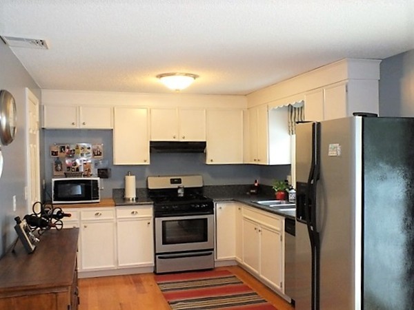 63 Albemarle Road Longmeadow, MA 01106 - Photo 7 of 27 a kitchen with stainless steel appliances a refrigerator stove and sink
