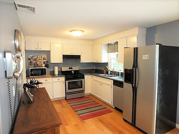 63 Albemarle Road Longmeadow, MA 01106 - Photo 9 of 27 a kitchen with stainless steel appliances granite countertop a refrigerator stove and sink