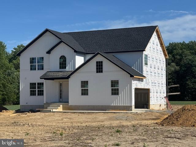 661 West Evens Road Viola, DE 19979 - Photo 1 of 14 a view of a house with snow on the side of the road