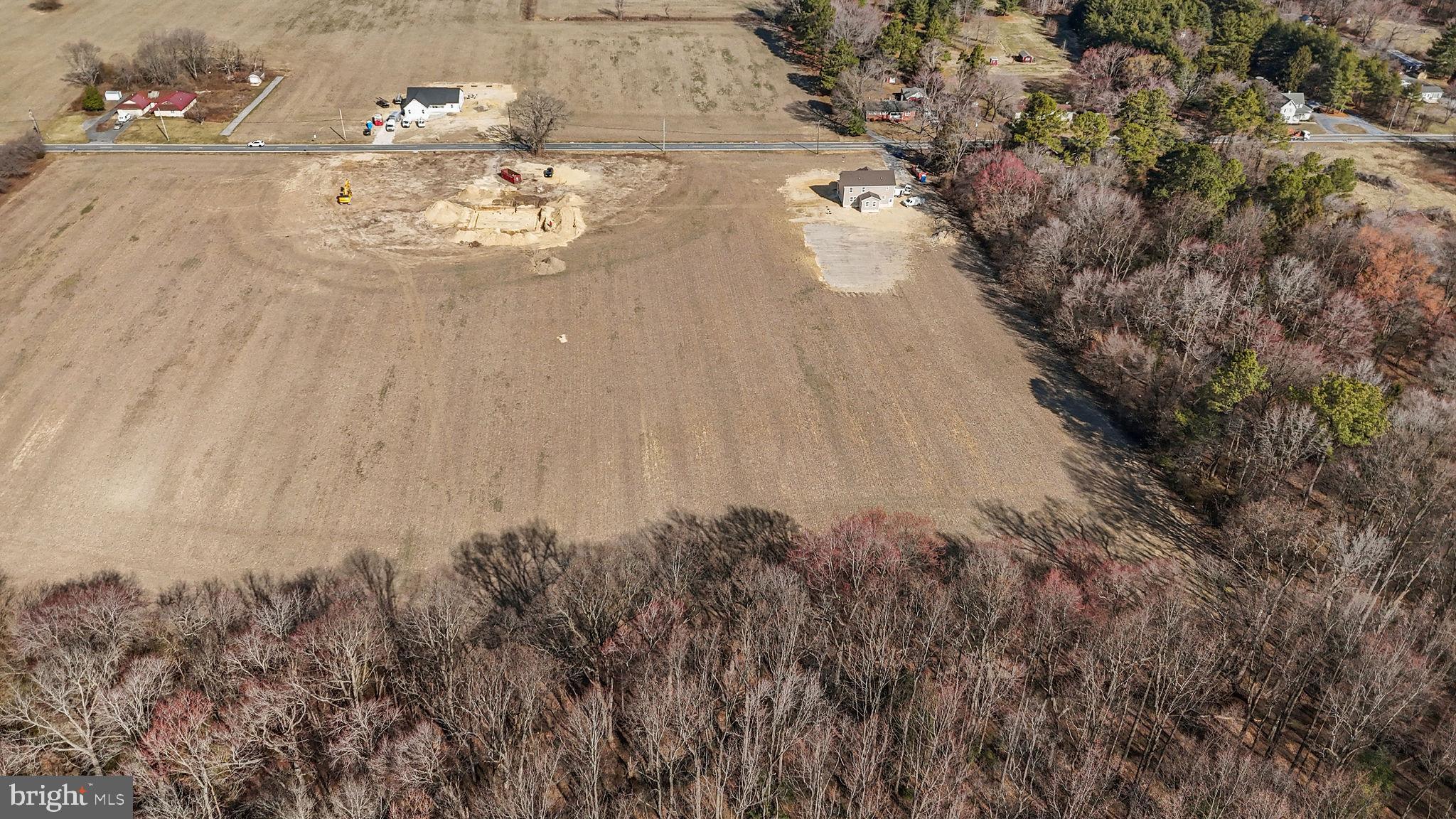 661 West Evens Road Viola, DE 19979 - Photo 9 of 14 a view of a flower in a yard