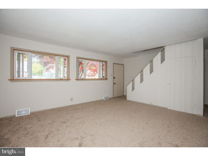 2410 Secane Road Secane, PA 19018 - Photo 3 of 25 a view of an empty room with a window