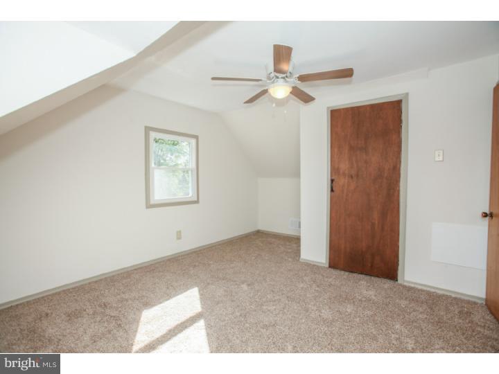 2410 Secane Road Secane, PA 19018 - Photo 22 of 25 a view of an empty room with a window