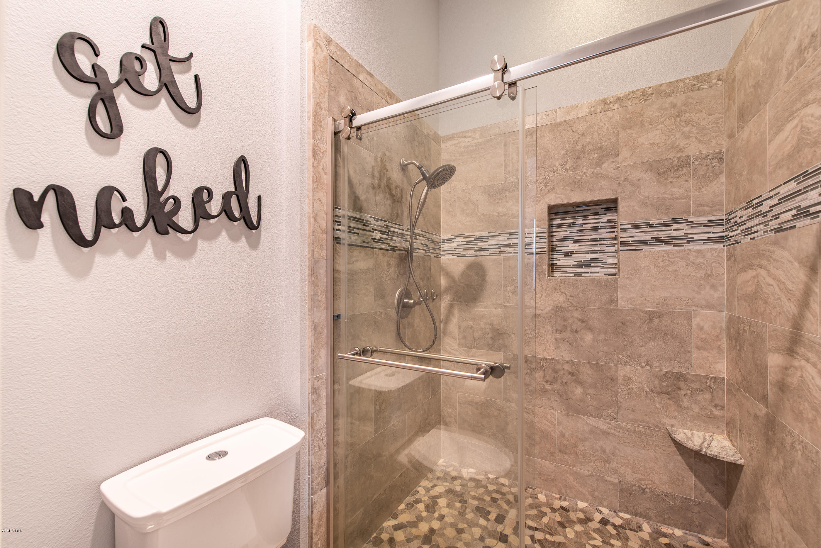 308 Hedge Row Lane, Unit B Simi Valley, CA 93065 - Photo 20 of 27 a bathroom with a shower and a toilet