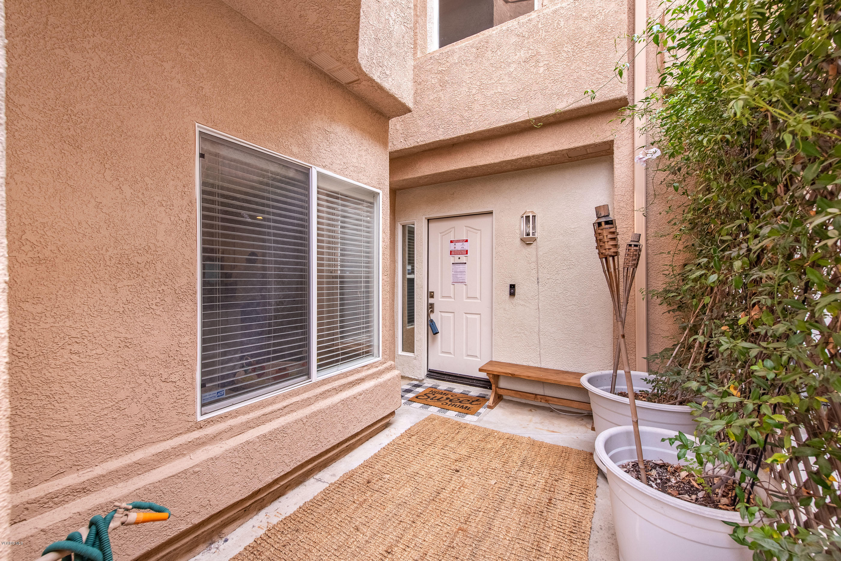 308 Hedge Row Lane, Unit B Simi Valley, CA 93065 - Photo 3 of 27 a view of a living room with a large window