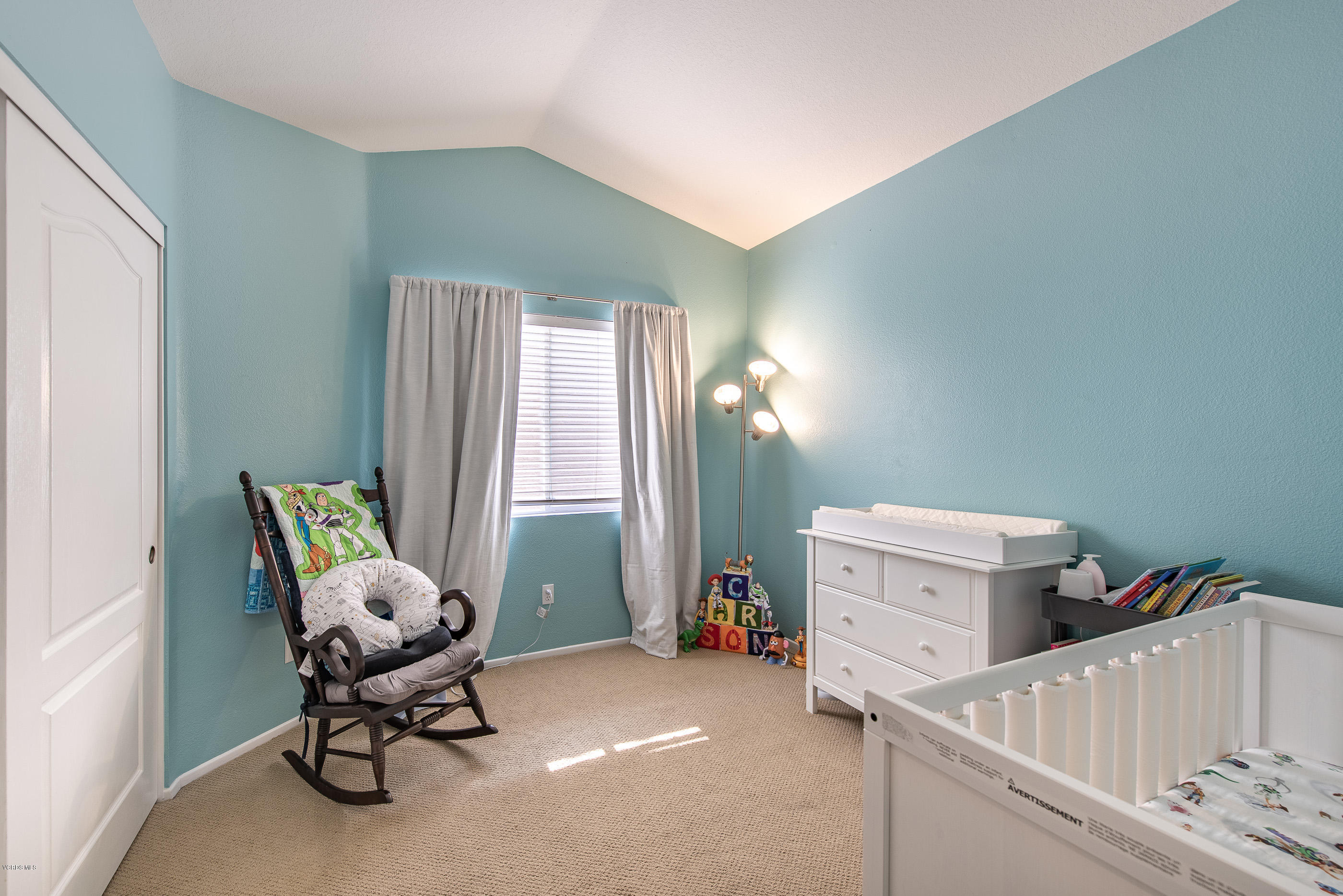 308 Hedge Row Lane, Unit B Simi Valley, CA 93065 - Photo 22 of 27 a room with furniture and windows