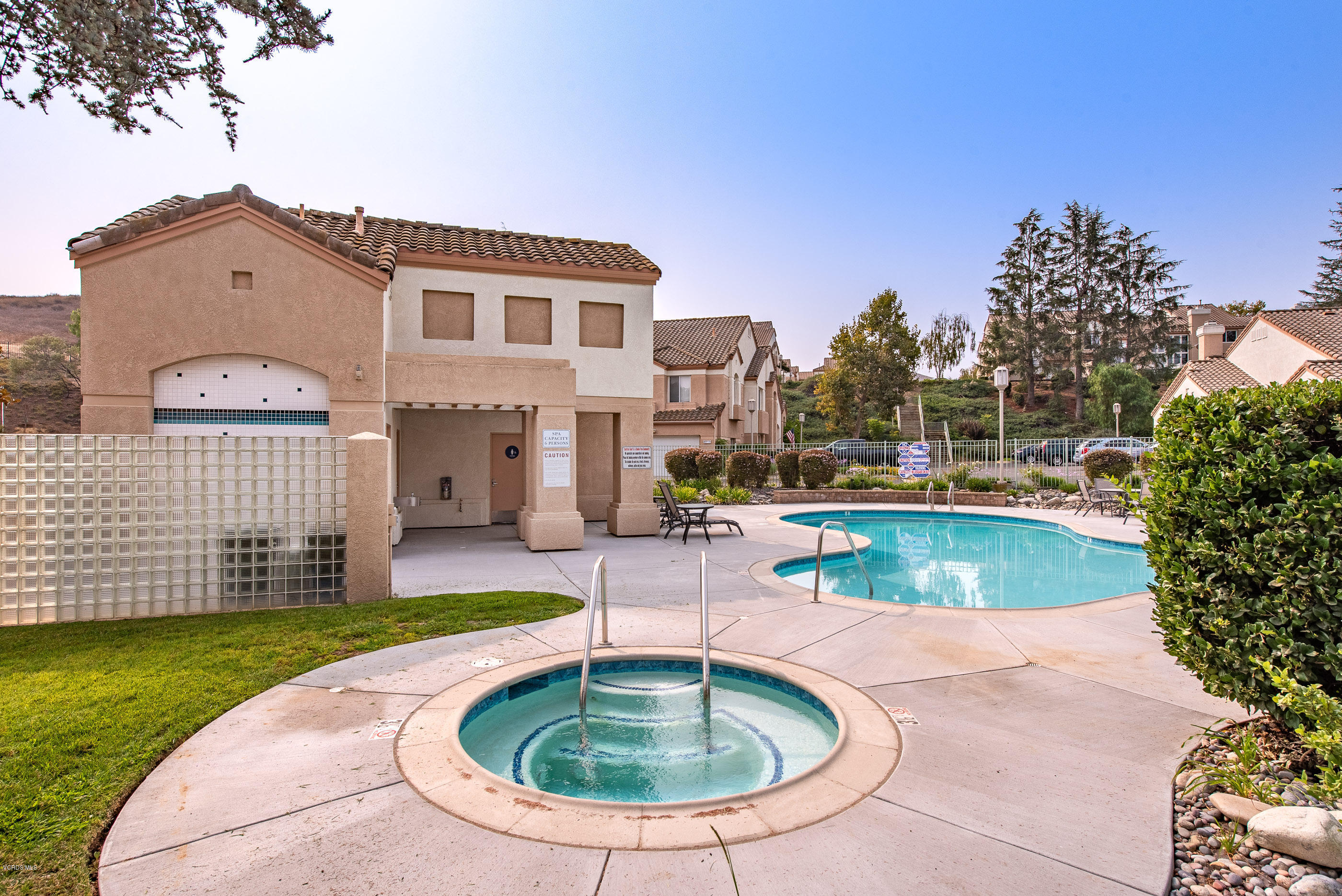 308 Hedge Row Lane, Unit B Simi Valley, CA 93065 - Photo 26 of 27 a view of a house with swimming pool