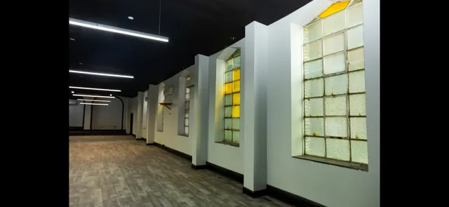 a view of a lobby with gym equipment