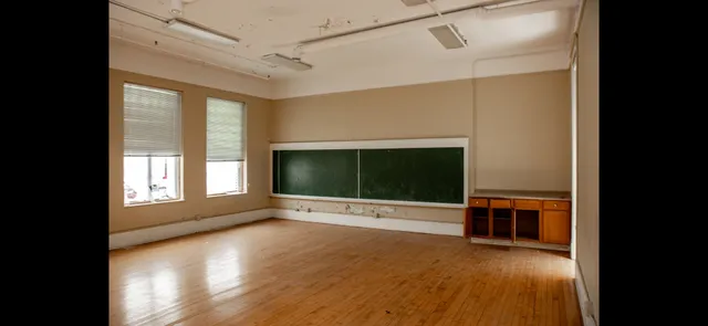 a view of entryway and kitchen
