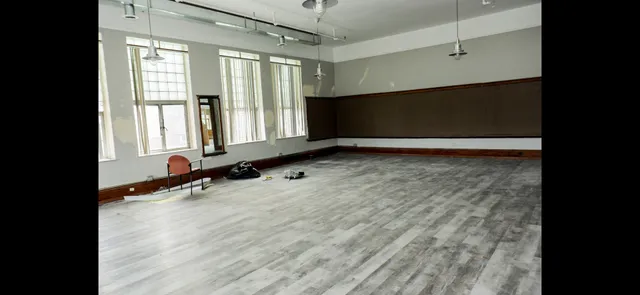 a kitchen that has a sink and cabinets