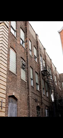 a black and white photo of a house