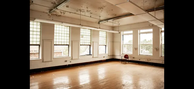 a bathroom with a shower and toilet