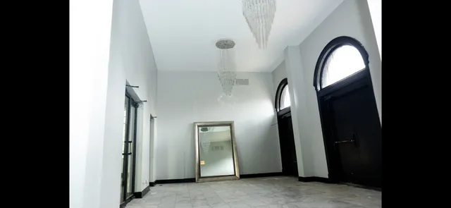 a view of a livingroom with wooden floor