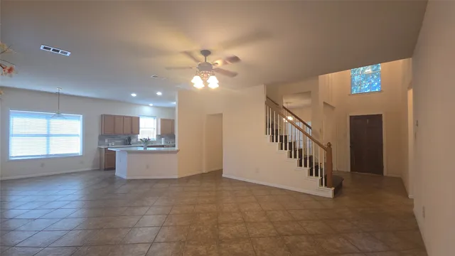 a view of entryway and kitchen