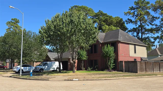 a view of a house with a swimming pool