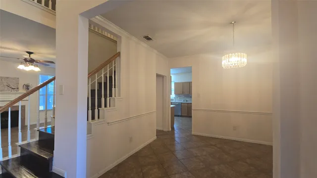 a view of a hallway with workspace