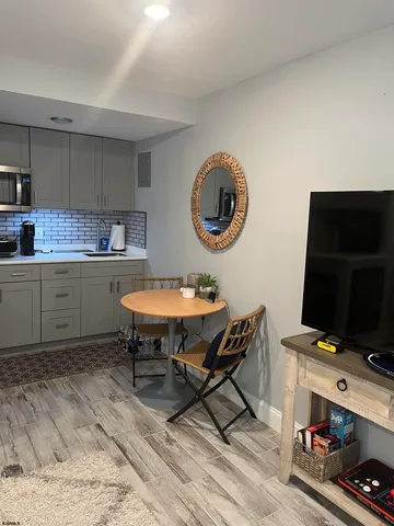 a view of a workspace with furniture