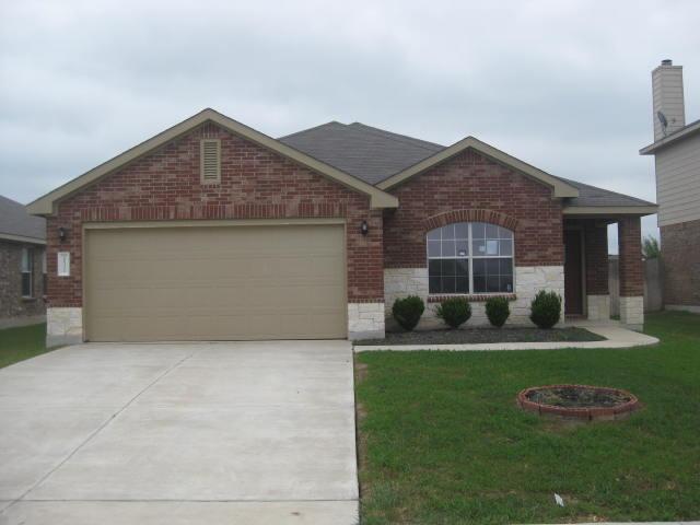 20321 Merlin Falcon Trail Pflugerville, TX 78660 - Photo 1 of 1 a front view of a house with a yard