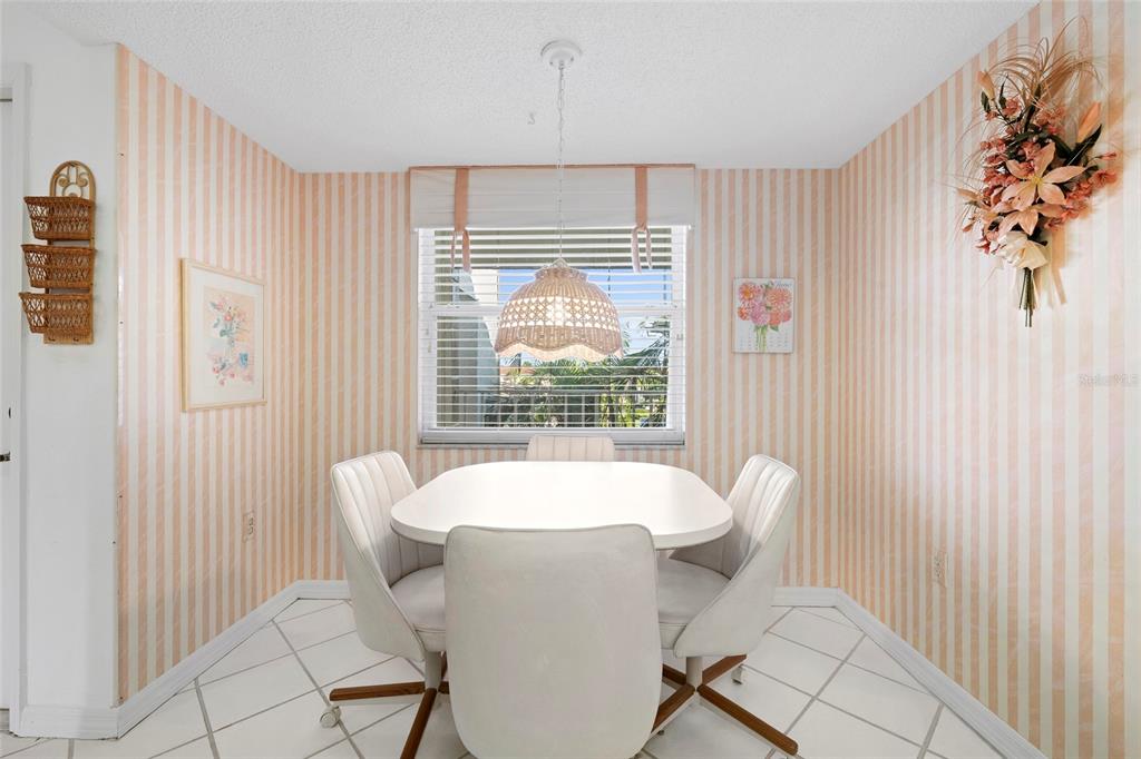 6507 Stone River Road, Unit 304 Bradenton, FL 34203 - Photo 11 of 51 a living room with furniture and a window