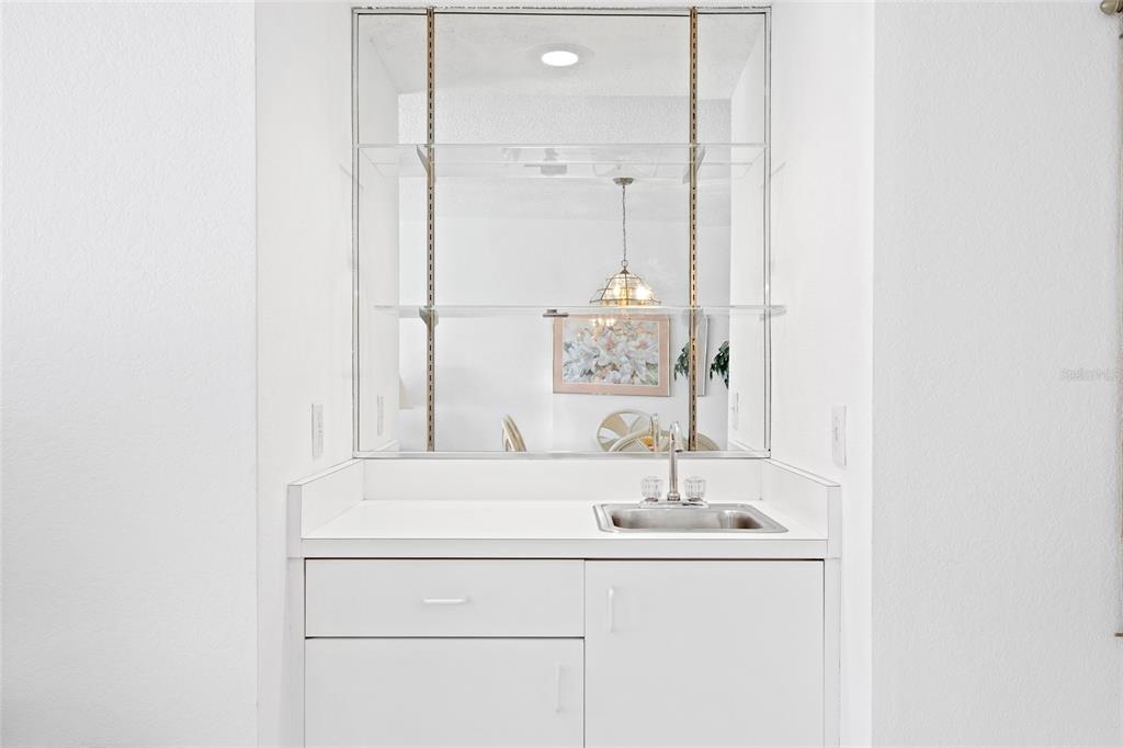 6507 Stone River Road, Unit 304 Bradenton, FL 34203 - Photo 16 of 51 a bathroom with a sink and a mirror