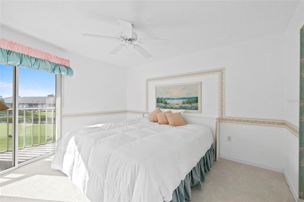 6507 Stone River Road, Unit 304 Bradenton, FL 34203 - Photo 17 of 51 a bedroom with a bed and a window
