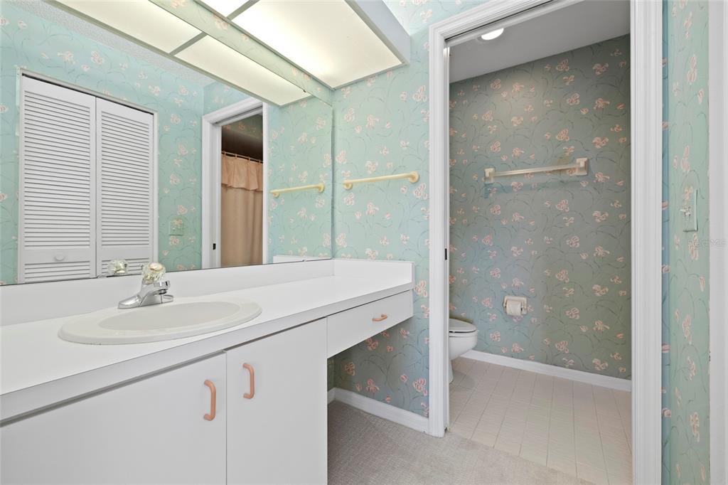 6507 Stone River Road, Unit 304 Bradenton, FL 34203 - Photo 19 of 51 a bathroom with a sink and a mirror