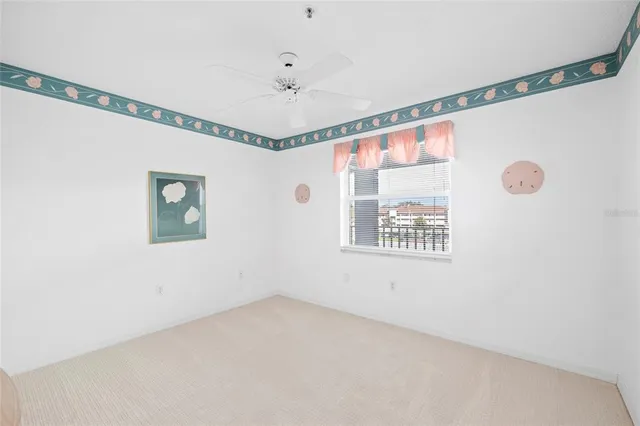 a view of a patio with a table chairs and a table