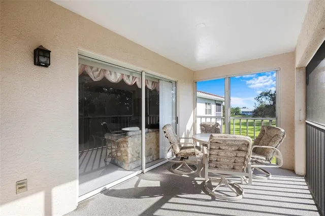 a view of a wooden house with a yard