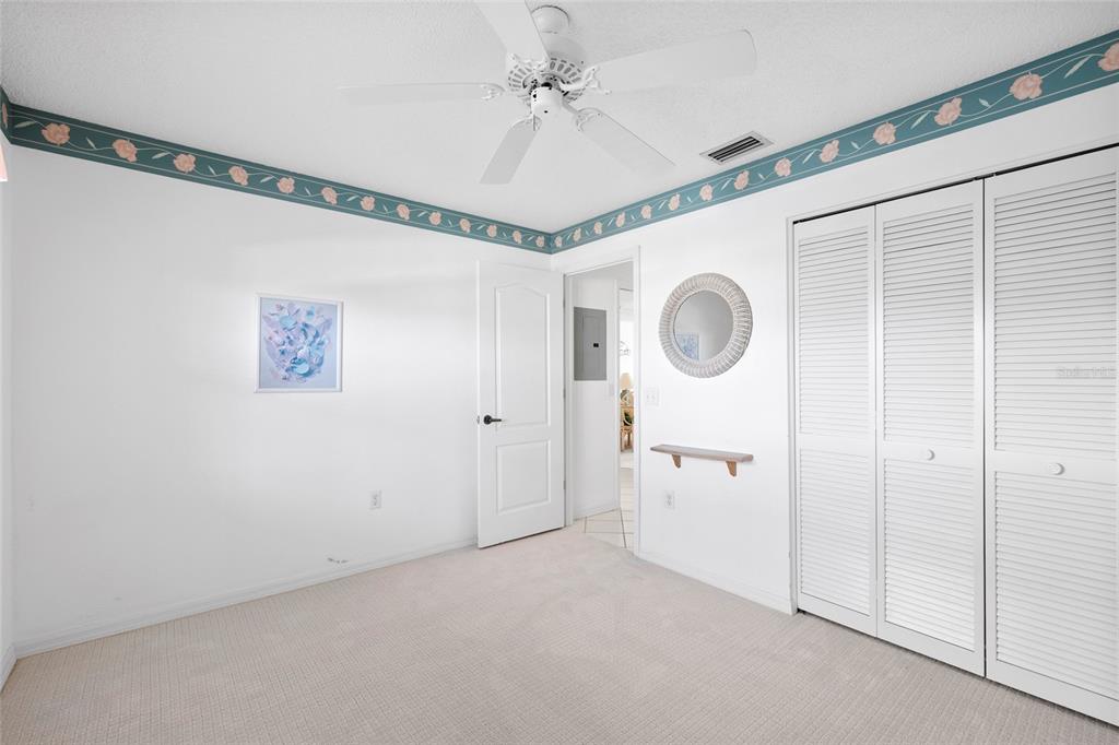 6507 Stone River Road, Unit 304 Bradenton, FL 34203 - Photo 23 of 51 a view of a livingroom with a chandelier fan