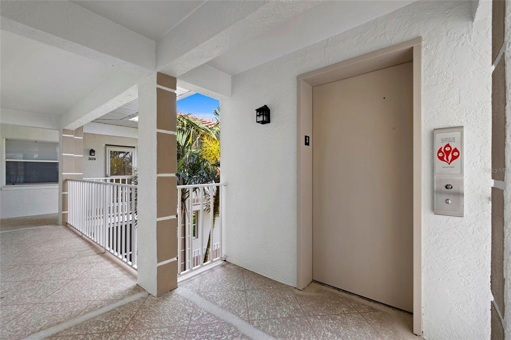 6507 Stone River Road, Unit 304 Bradenton, FL 34203 - Photo 27 of 51 a view interior of a house with wooden floor and entryway