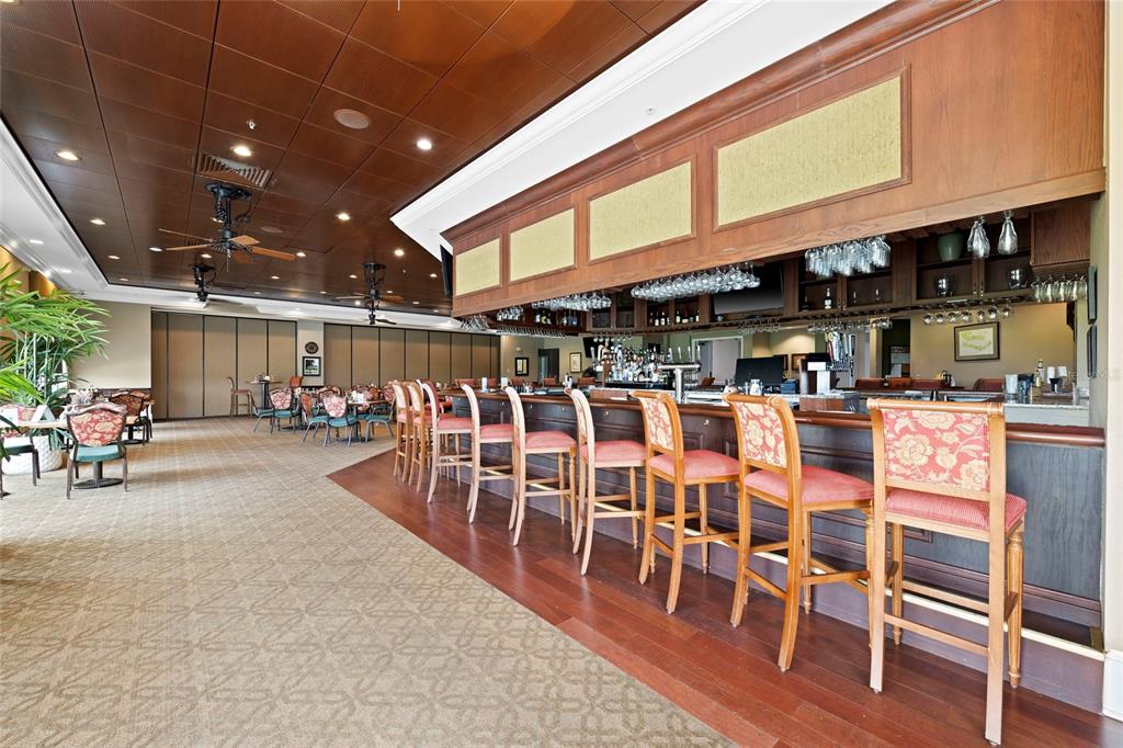 6507 Stone River Road, Unit 304 Bradenton, FL 34203 - Photo 41 of 51 a dinning table and chairs in a room