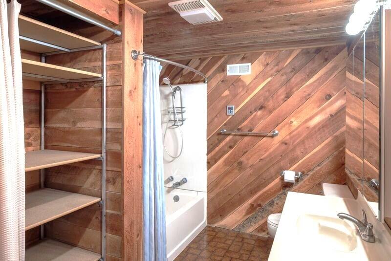 1391 North County Road Norwood, CO 81423 - Photo 23 of 34 a bathroom with a shower and a sink