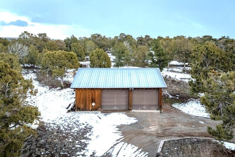 1391 North County Road Norwood, CO 81423 - Photo 25 of 34 front view of a house with a yard