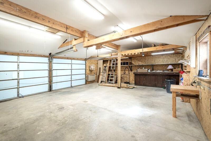 1391 North County Road Norwood, CO 81423 - Photo 26 of 34 a view of a garage with furniture