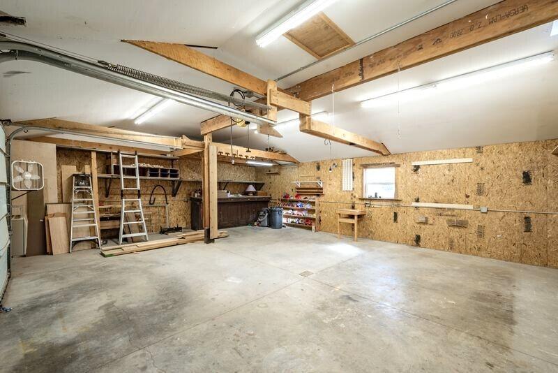 1391 North County Road Norwood, CO 81423 - Photo 27 of 34 a view of a garage with furniture