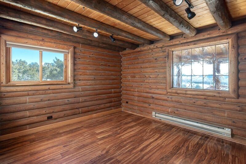 1391 North County Road Norwood, CO 81423 - Photo 7 of 34 a view of empty room with windows