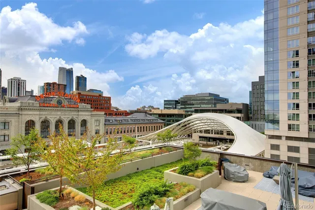 a view of a swimming pool with a terrace