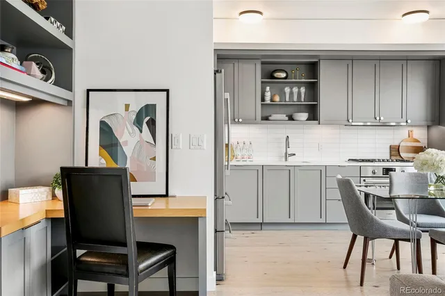 a view of kitchen with cabinets and outdoor seating
