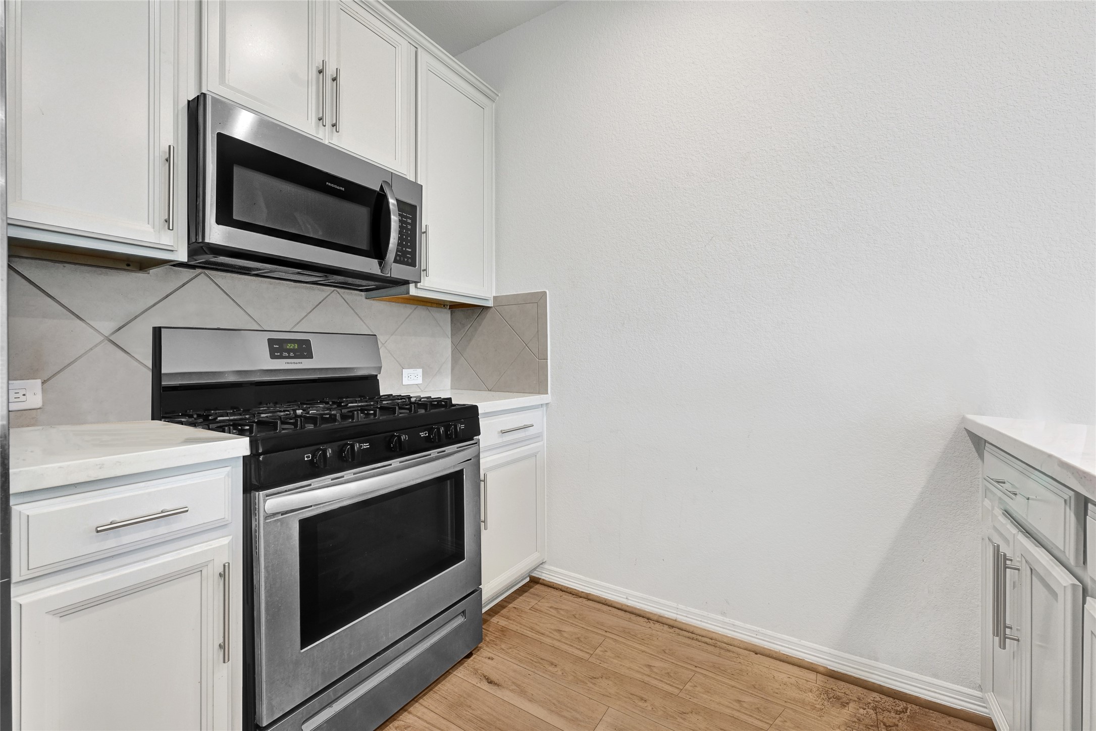 6320 Paris Street Houston, TX 77021 - Photo 7 of 16 a stove top oven sitting inside of a kitchen