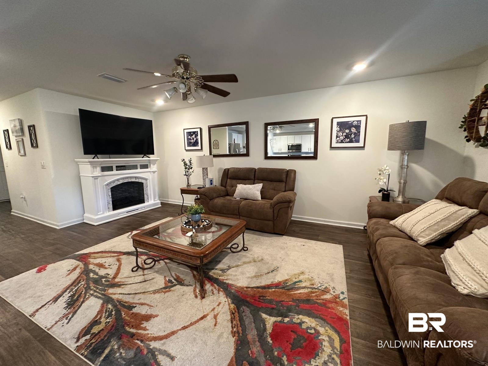 23792 Unbridled Loop Daphne, AL 36526 - Photo 6 of 36 Living area with a fireplace, dark wood-type flooring, a ceiling fan, and recessed lighting